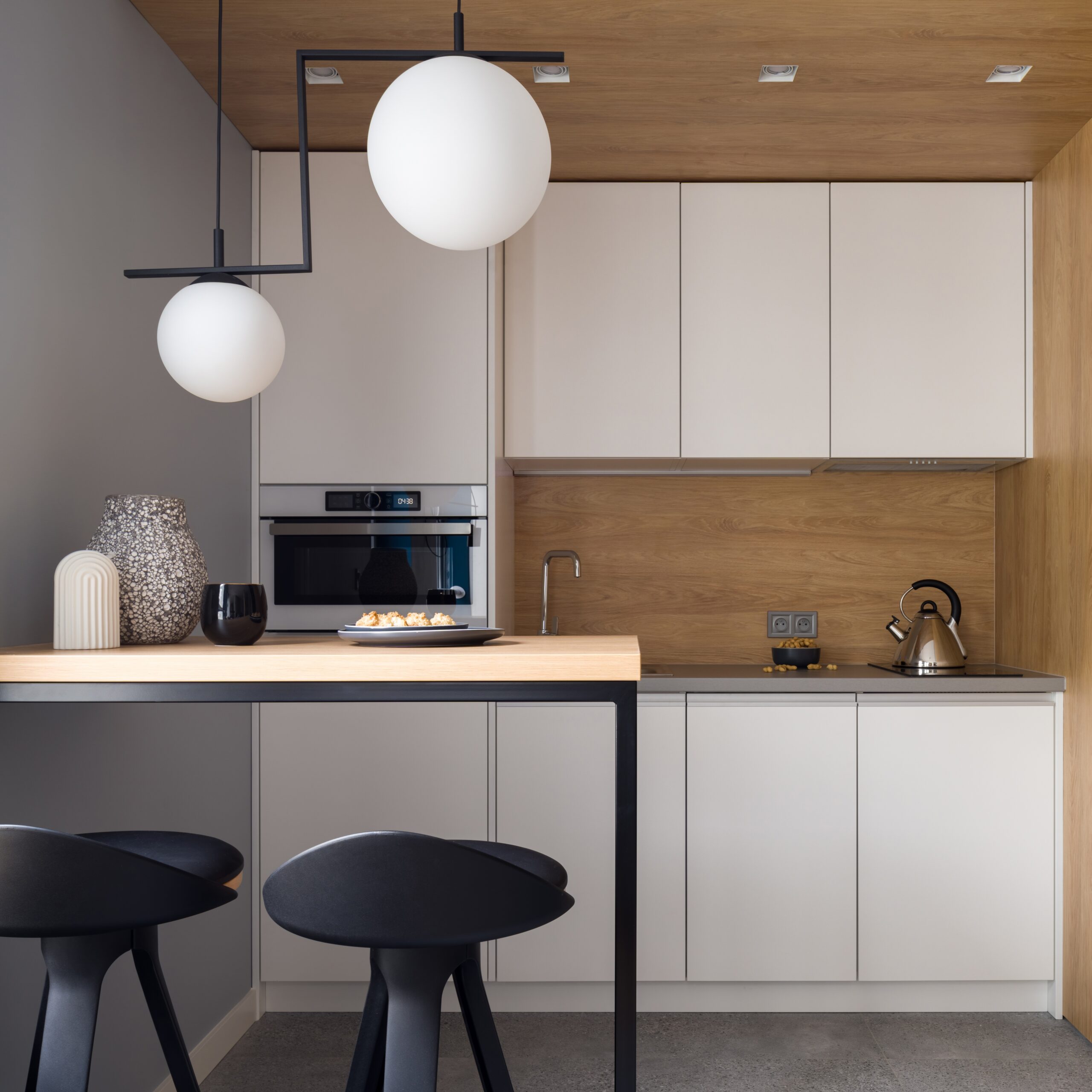 Small,And,Modern,Kitchen,With,White,Furniture,,Stylish,Lamps,,Table
